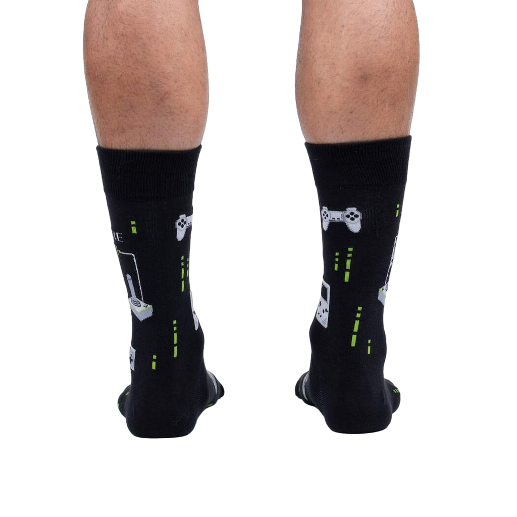 Rear view of the 'Game On' socks on a person's legs, showing the full design from behind.