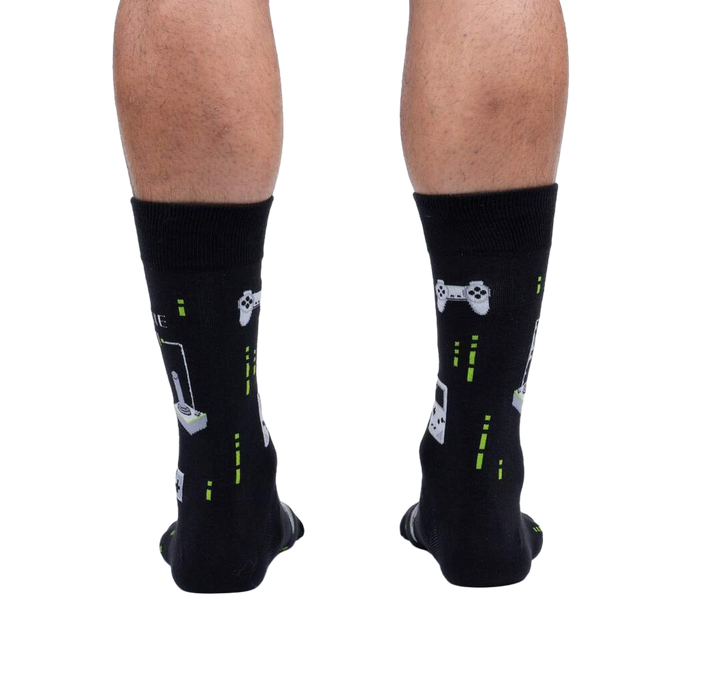 Rear view of the 'Game On' socks on a person's legs, showing the full design from behind.