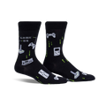 Pair of black crew socks with retro gaming controllers, joysticks, and pixelated designs in light green.  'Game On' text is also visible.