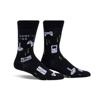 black crew socks with video game controllers and joysticks pattern. perfect for the gamer in your life.   