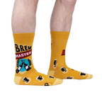 Lifestyle shot of a person wearing the Brewmaster socks, showcasing the fit and style on a leg.