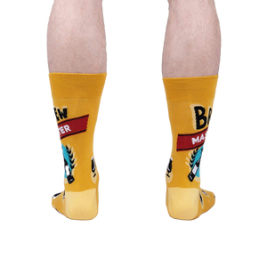 Rear view of the Brewmaster socks on a person's legs, highlighting the full design and how it looks from the back.