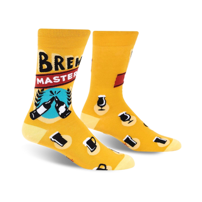 yellow crew socks with beer glasses, bottles, and hops. "brewmaster" in black text with a red banner. mens.  