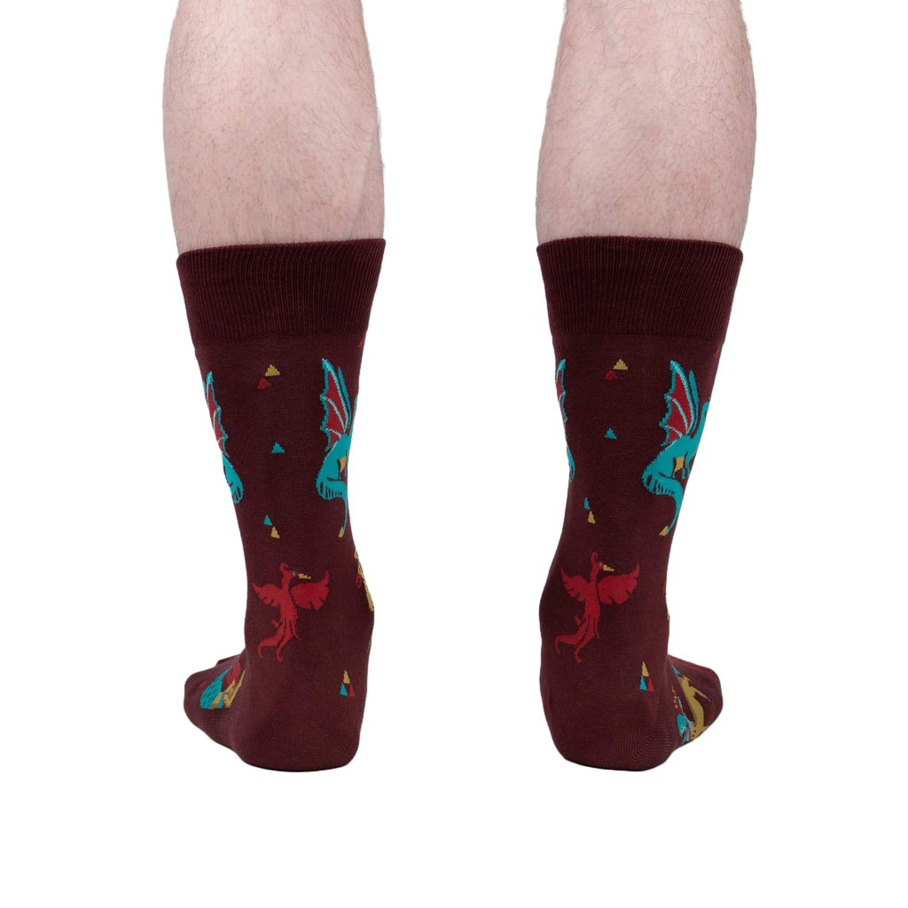 Rear view of a model's legs wearing the Beasts of Yore socks, highlighting the back design of the socks.