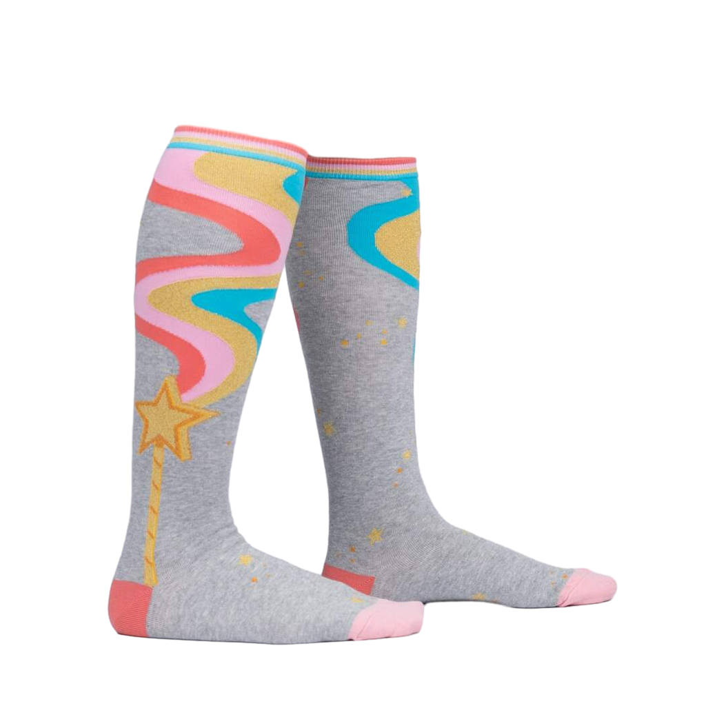 Lifestyle shot of a person wearing the 'It's Magic' knee-high socks, showing the socks' design and fit.