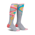Pair of grey knee-high socks with pink, orange, and teal wavy lines resembling a magic wand with a gold star.  Features gold glitter accents.