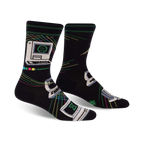 Black crew socks with a retro computer design, featuring pixel art, rainbow colored lines, and the text 'LOADING...' in green.