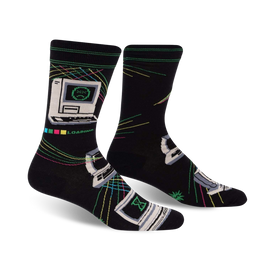 black crew socks with 8-bit computer graphics, binary numbers, and circuit board-like lines, with "loading" at the top.  