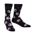Black crew socks with a repeating pattern of purple and red eyeball designs. The socks glow in the dark.