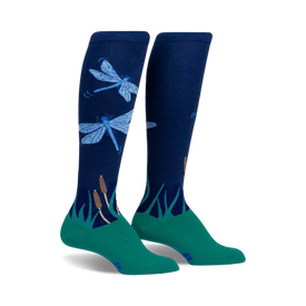 women's knee-high dragonfly by night socks in blue, pink, and green feature dragonflies and cattails.   