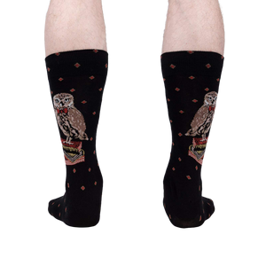 A rear view of the socks on a person's legs showing the back of the socks and the full design.