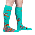 Lifestyle shot showing the 'Friends with Benefish' knee-high socks on a person's legs against a light grey background.