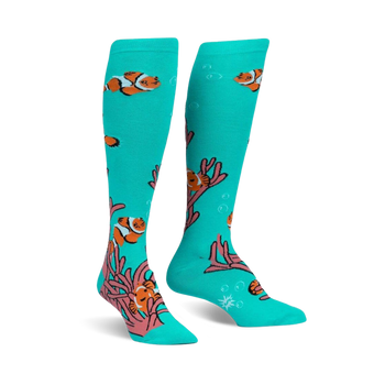knee-high teal socks featuring a pattern of cartoon clownfish and pink/orange sea anemones. women's.   