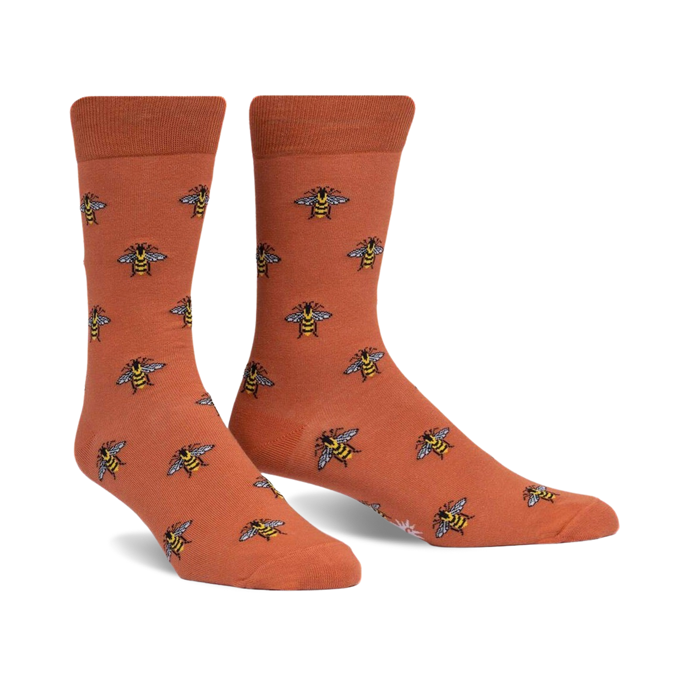 Pair of terracotta crew socks with a repeating pattern of illustrated bees. 