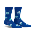 Pair of blue crew socks with a fun jellyfish pattern in teal and white.  The socks glow in the dark!