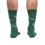 Rear view of a model wearing the 'My Other Car is a Lawnmower' socks. Provides a full view of the design on the back of the socks.