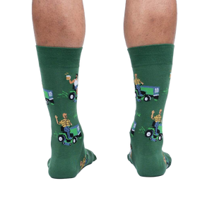Rear view of a model wearing the 'My Other Car is a Lawnmower' socks. Provides a full view of the design on the back of the socks.