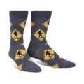 Crew socks in grey with a repeating pattern of yellow diamond-shaped Bigfoot crossing signs. Fun, quirky design.