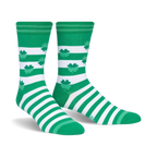 Pair of green and white striped crew socks featuring shamrock patterns. 