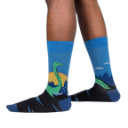 Lifestyle shot showing the Loch Ness socks on a person's legs, highlighting the fit and design on feet.