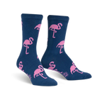 Pair of navy blue crew socks with a pink flamingo pattern.  The socks are fuzzy and feature repeating flamingo designs.