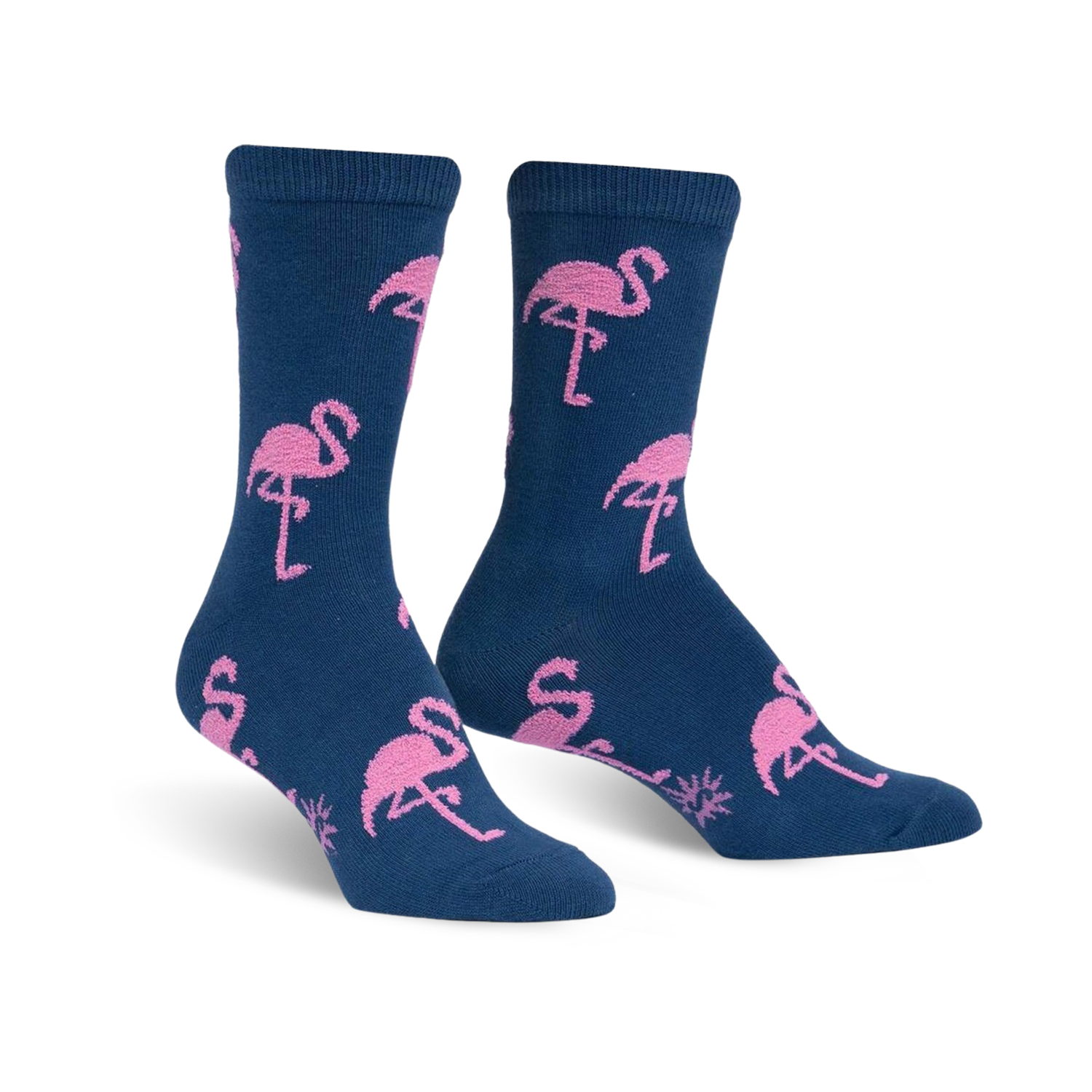 Pair of navy blue crew socks with a pink flamingo pattern.  The socks are fuzzy and feature repeating flamingo designs.