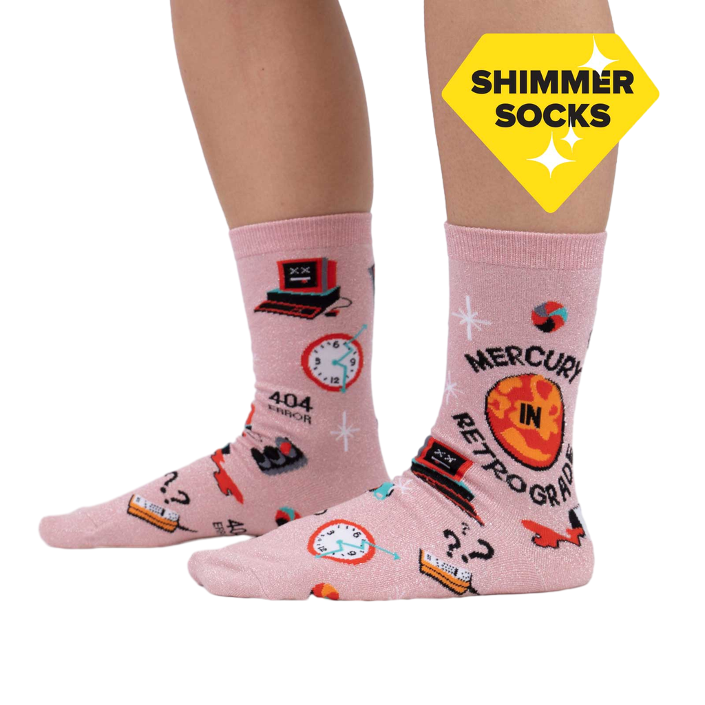 Lifestyle shot showing the 'Mercury in Retrograde' socks on a person's feet, highlighting the shimmer and fit.