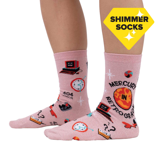 Lifestyle shot showing the 'Mercury in Retrograde' socks on a person's feet, highlighting the shimmer and fit.