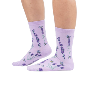 Lifestyle shot showing the socks on a person's legs against a white background.