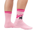 Lifestyle shot of a person wearing a pair of pink 'Bad Ass Cat' crew socks.