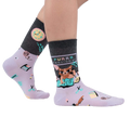 Lifestyle shot showing the socks on a person's feet against a white background.