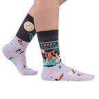Lifestyle shot showing the socks on a person's feet against a white background.