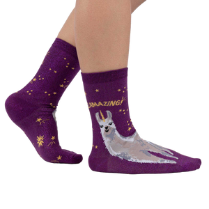 Lifestyle photo showing the Llama Shimmer socks on a model's feet.