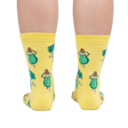 Rear view of a person wearing Plant Powered socks, highlighting the design on the back of the socks.
