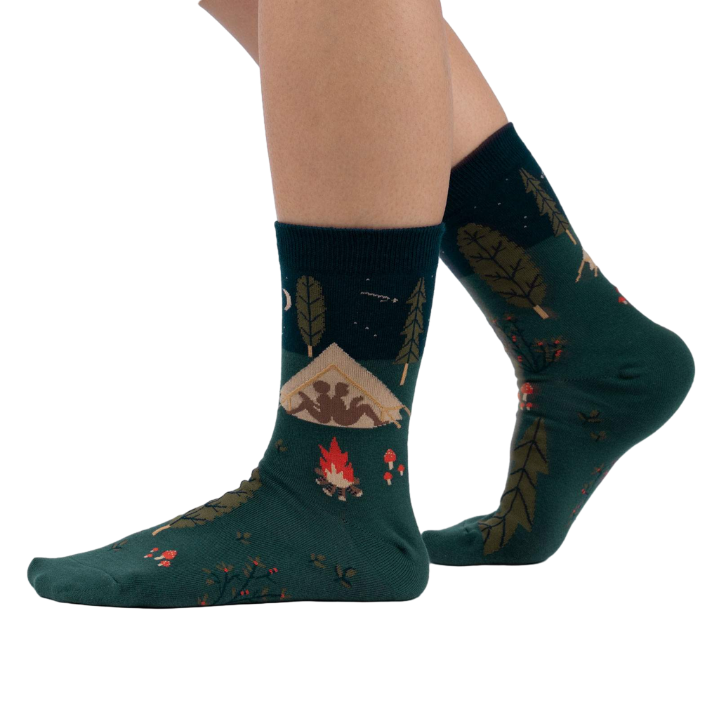 Lifestyle shot of 'Off The Grid' socks on a person's feet, showcasing the socks' design and fit.