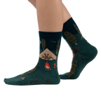 Lifestyle shot of 'Off The Grid' socks on a person's feet, showcasing the socks' design and fit.