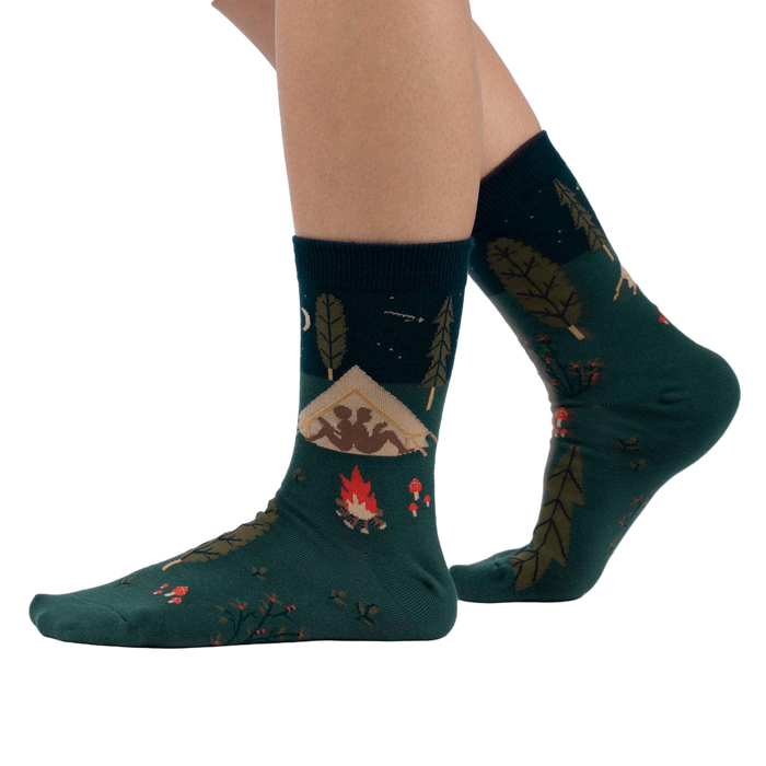Lifestyle shot of 'Off The Grid' socks on a person's feet, showcasing the socks' design and fit.
