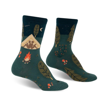 womens crew socks with forest camping themed imagery including trees, tents, campfires, and stars.  