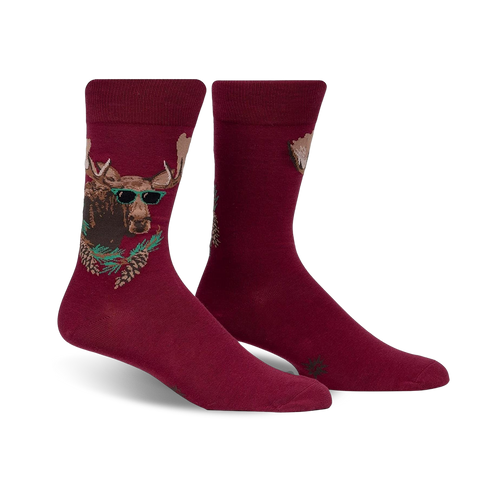Burgundy crew socks with a graphic of a moose wearing sunglasses surrounded by pine branches. 