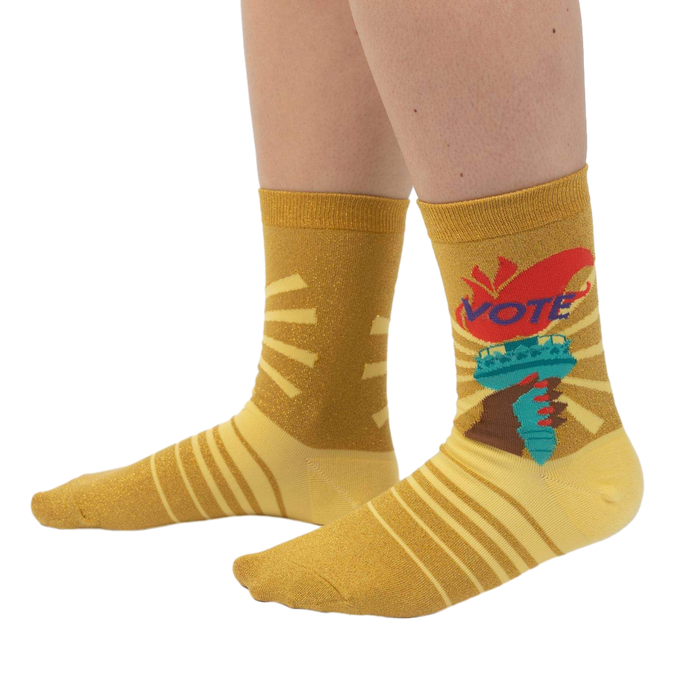 Lifestyle shot showing the socks on a person's feet, showcasing fit and style.