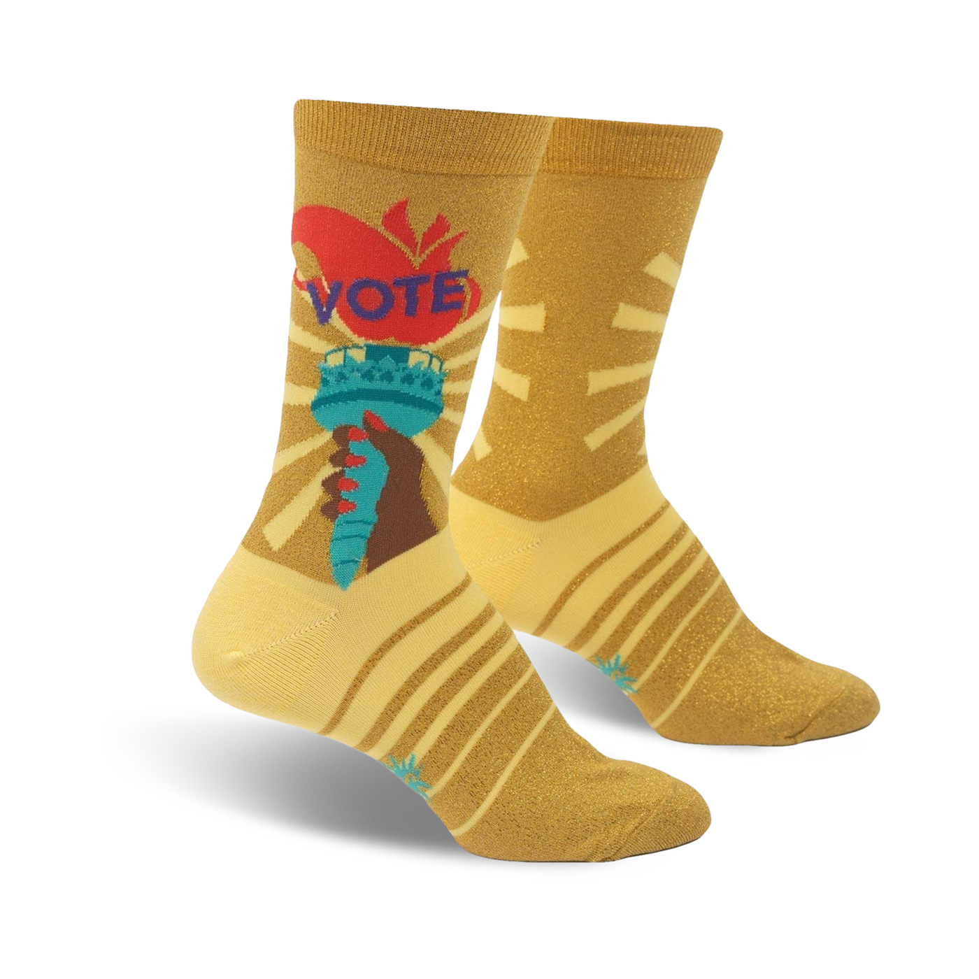 Crew socks in gold with a vibrant Statue of Liberty graphic, 'VOTE' text, and yellow-gold stripes. 