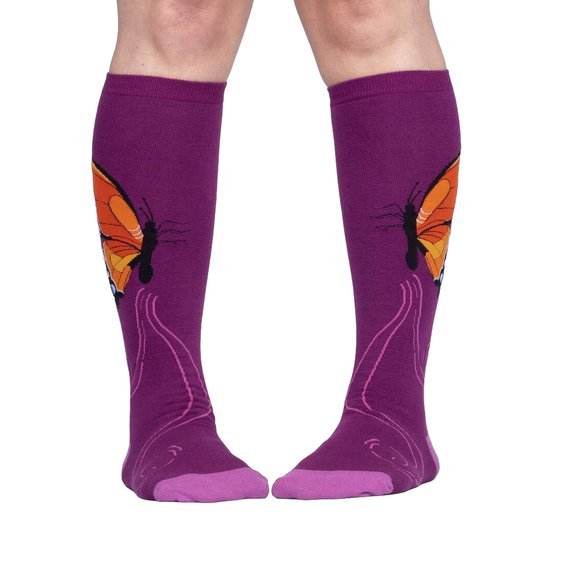 Lifestyle shot: A person is wearing purple knee-high socks with an orange butterfly design.