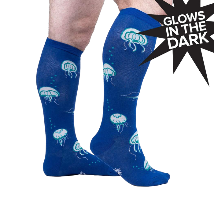 Lifestyle shot of model wearing 'Nice to Sea You' knee-high socks, showcasing the fit and design.