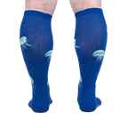 Rear view of 'Nice to Sea You' socks on a model, highlighting the full jellyfish print on the back.