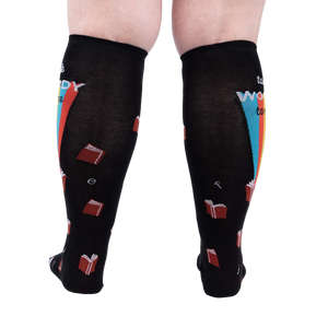 Back view of the 'Talk Wordy To Me' socks on a person's legs.  Shows the complete sock design.