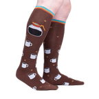 Lifestyle shot of a person's legs wearing the 'Pothead' coffee socks.  Shows how the socks look when worn.