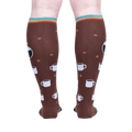 Rear view of a person wearing the 'Pothead' coffee socks, highlighting the full design.