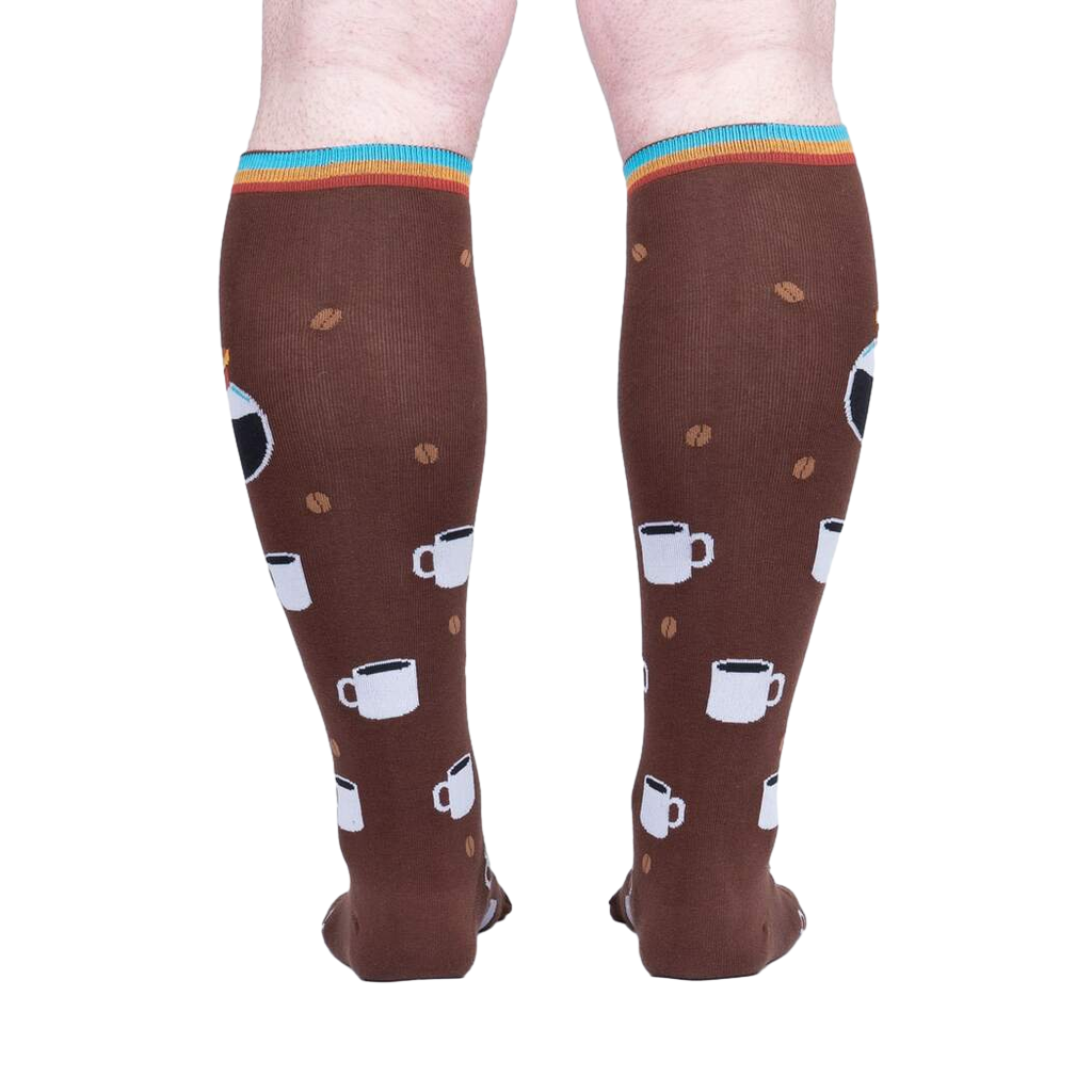 Rear view of a person wearing the 'Pothead' coffee socks, highlighting the full design.