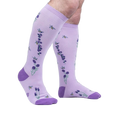 Lifestyle shot showing the socks on a person's legs, showcasing the fit and design.
