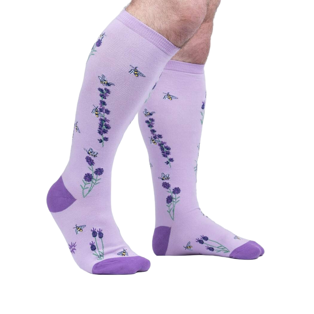 Lifestyle shot showing the socks on a person's legs, showcasing the fit and design.